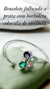 Bracelete folheado a prata com borboleta colorida de zircônia.